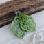 Picture of Ornament-Ohrstecker - Rhombusform aus Resin - olive green