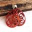 Bild von Ornament-Ohrstecker - Tropfenform aus Resin - mixed red pink