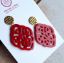 Bild von Ornament-Ohrringe aus Resin - cherry red - Stecker goldfarbig
